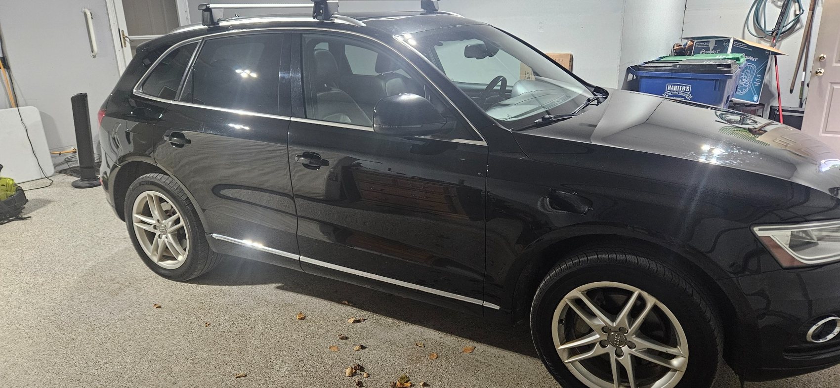 Clean black SUV in a garage